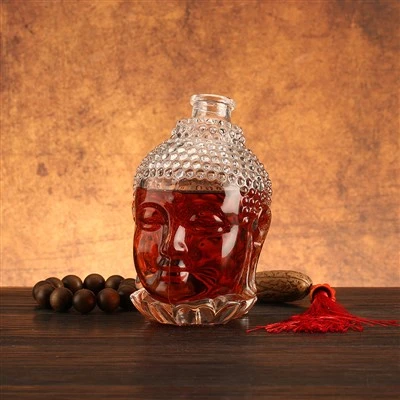 Hot Sale Špeciálna sklenená fľaša Buddha Head 700 ml